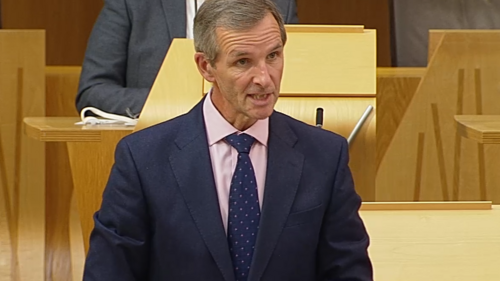 Liam speaking in chamber