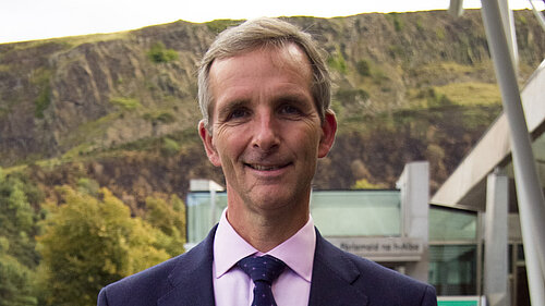 Liam McArthur smiling